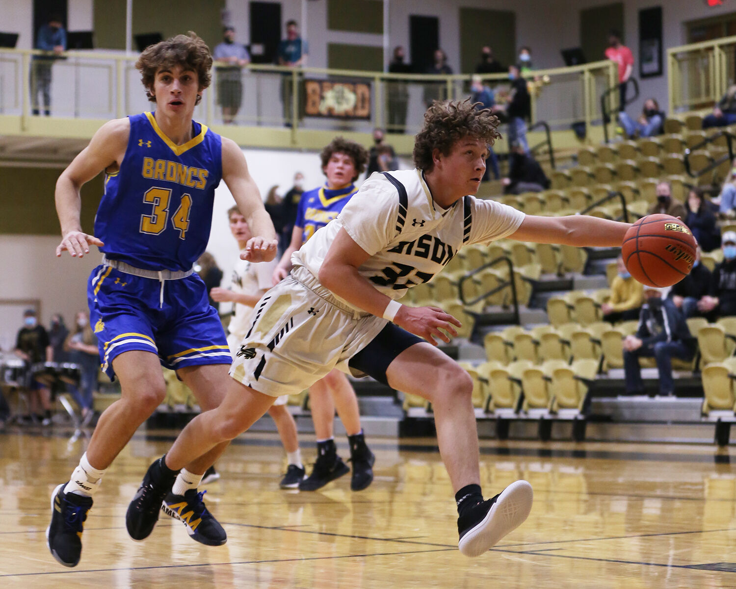 Calvin Rule dives to receive a pass under the basket